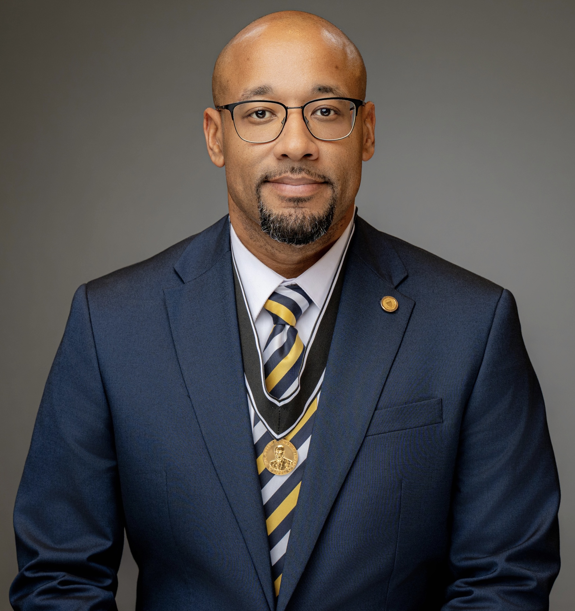Erick Ocasio in formal recognition portrait